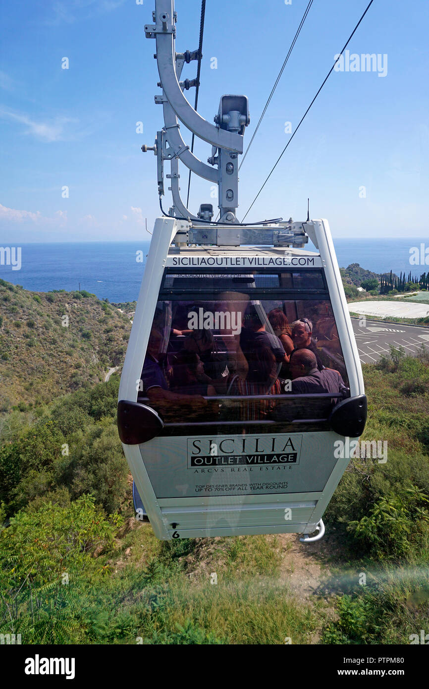 Cable car ride from the old town of Taormina to the beach of Mazzarò, Sicily, Italy Stock Photo