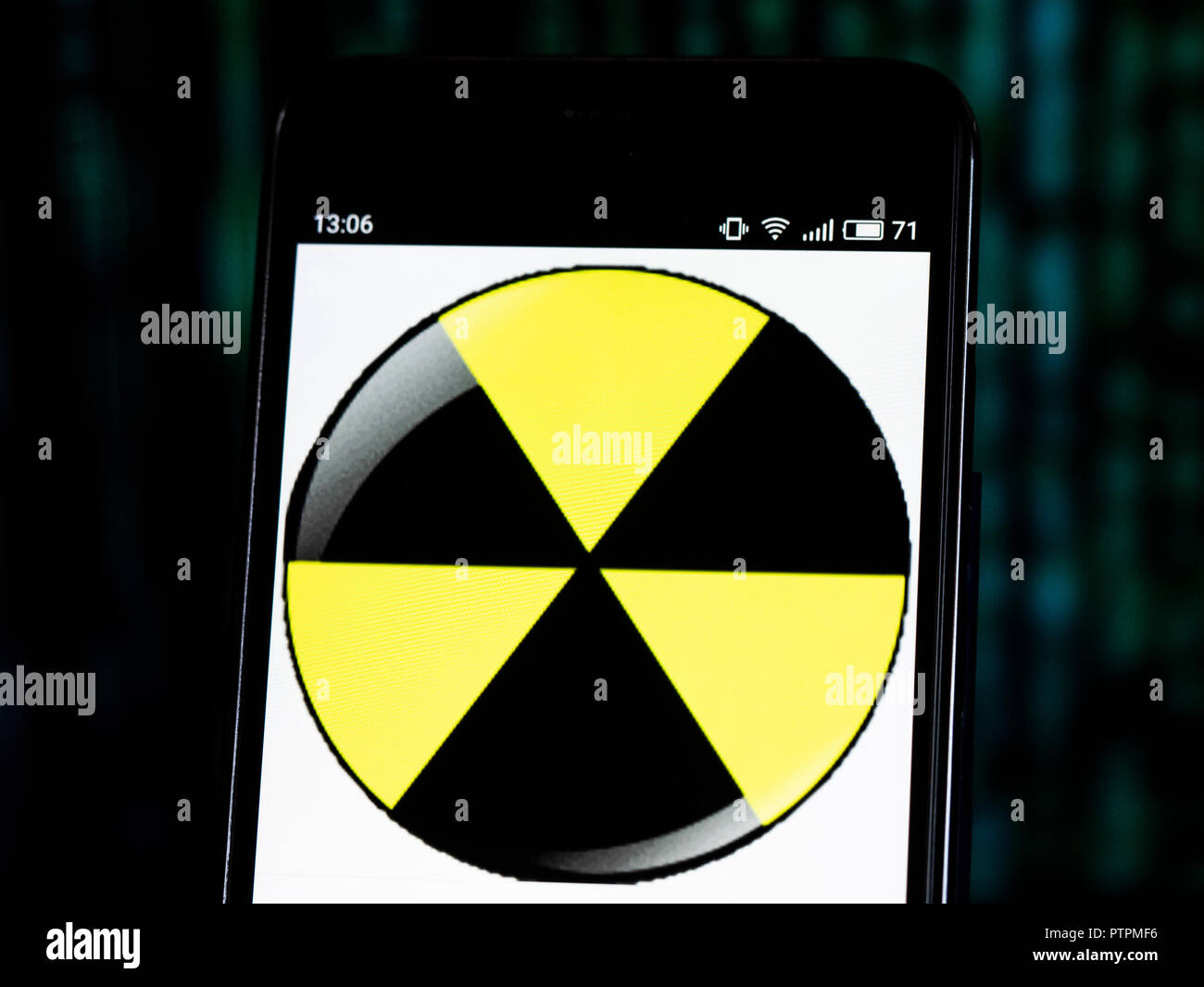 Ionizing radiation displayed on smart phone. Ionizing radiation