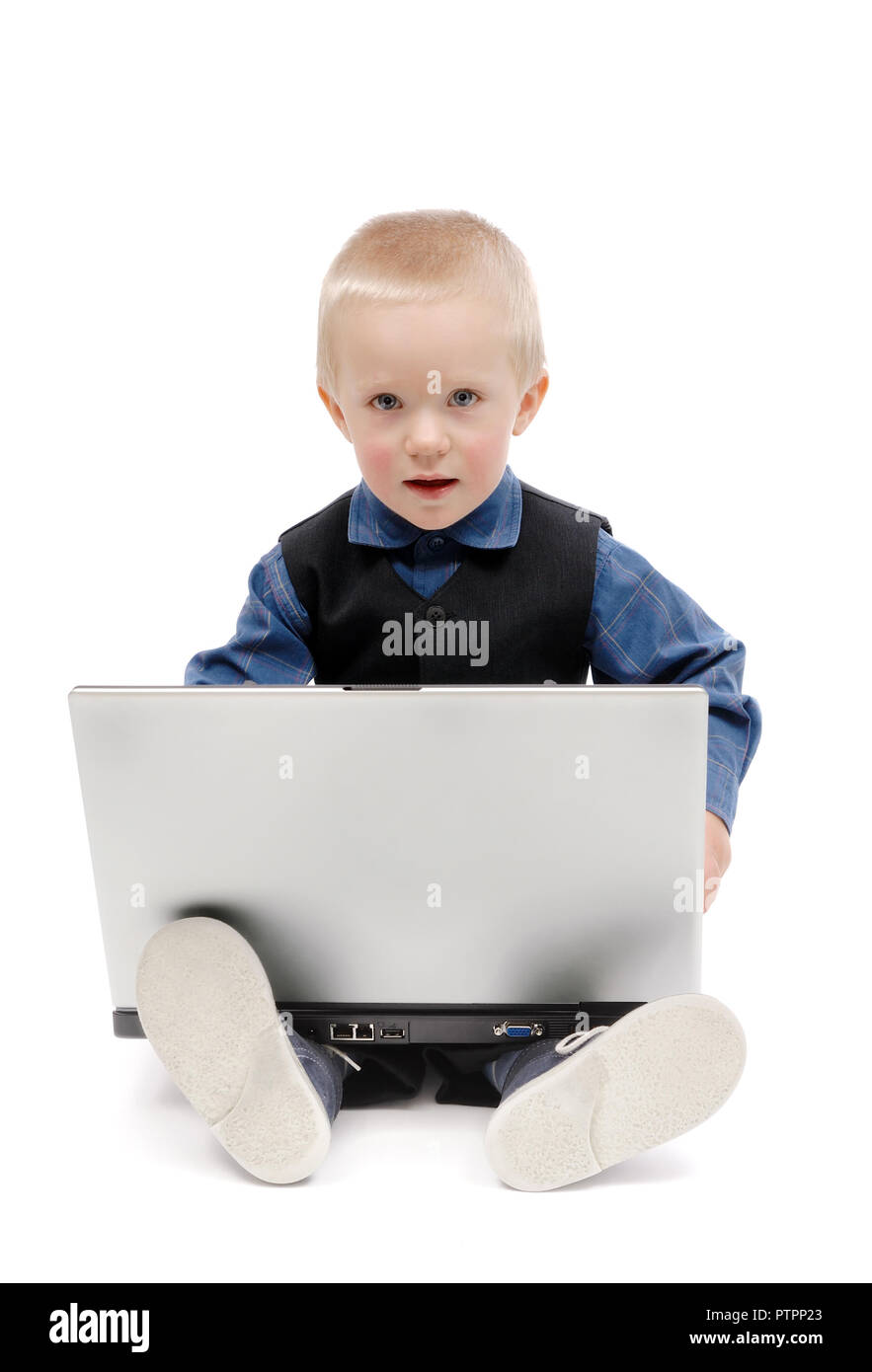 Little boy with a laptop on white background, isolated Stock Photo - Alamy