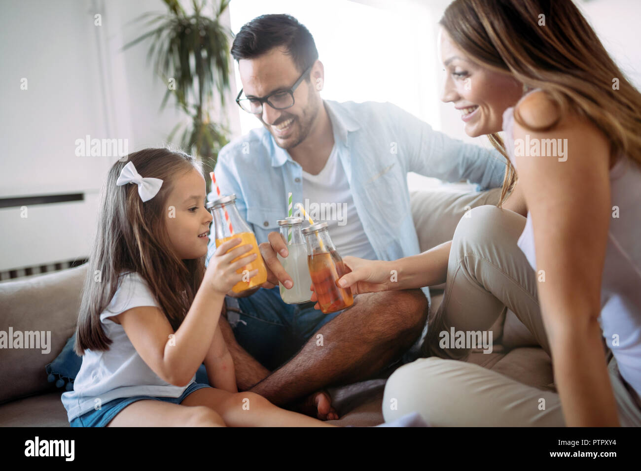 Happy family having fun time at home Stock Photo