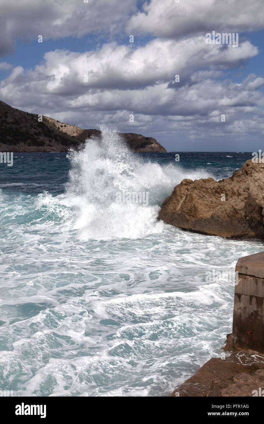 Storm Waves of Cala Agulla Europe Spain Coast near Cala Rajada, strong storm with high swell Stock Photo