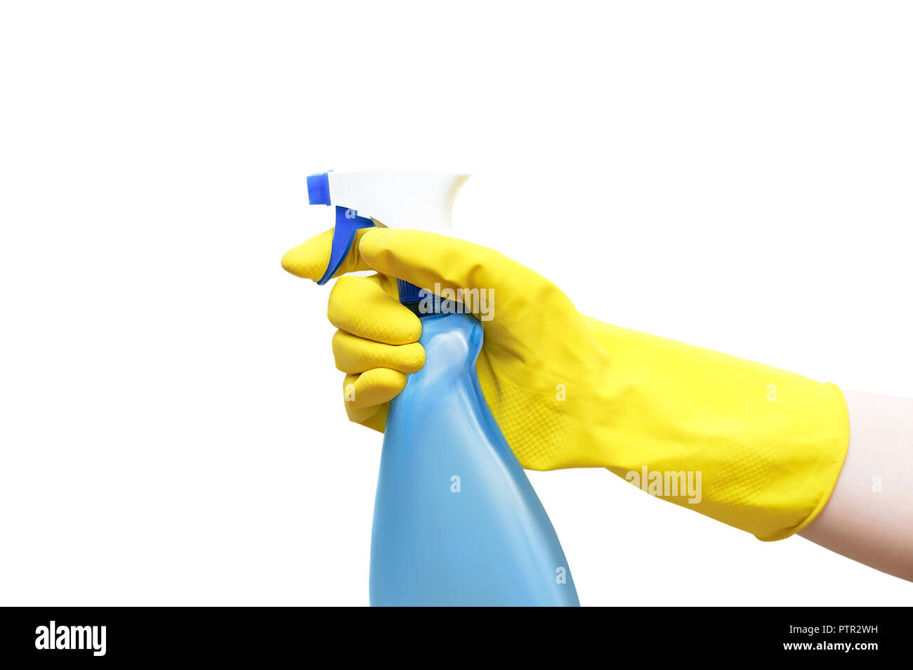 Hands in yellow rubber gloves hold a detergent with a pulvalizer for ...