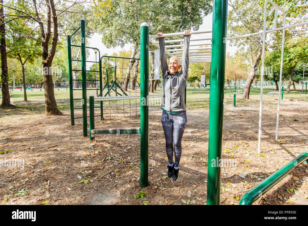 Fit Senior Woman Stretching At Outdoor Gym, Healthy Lifestyle Old People. Stock Photo