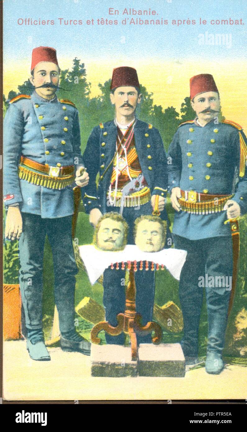Turkish military officers with heads of Albanians after the fighting