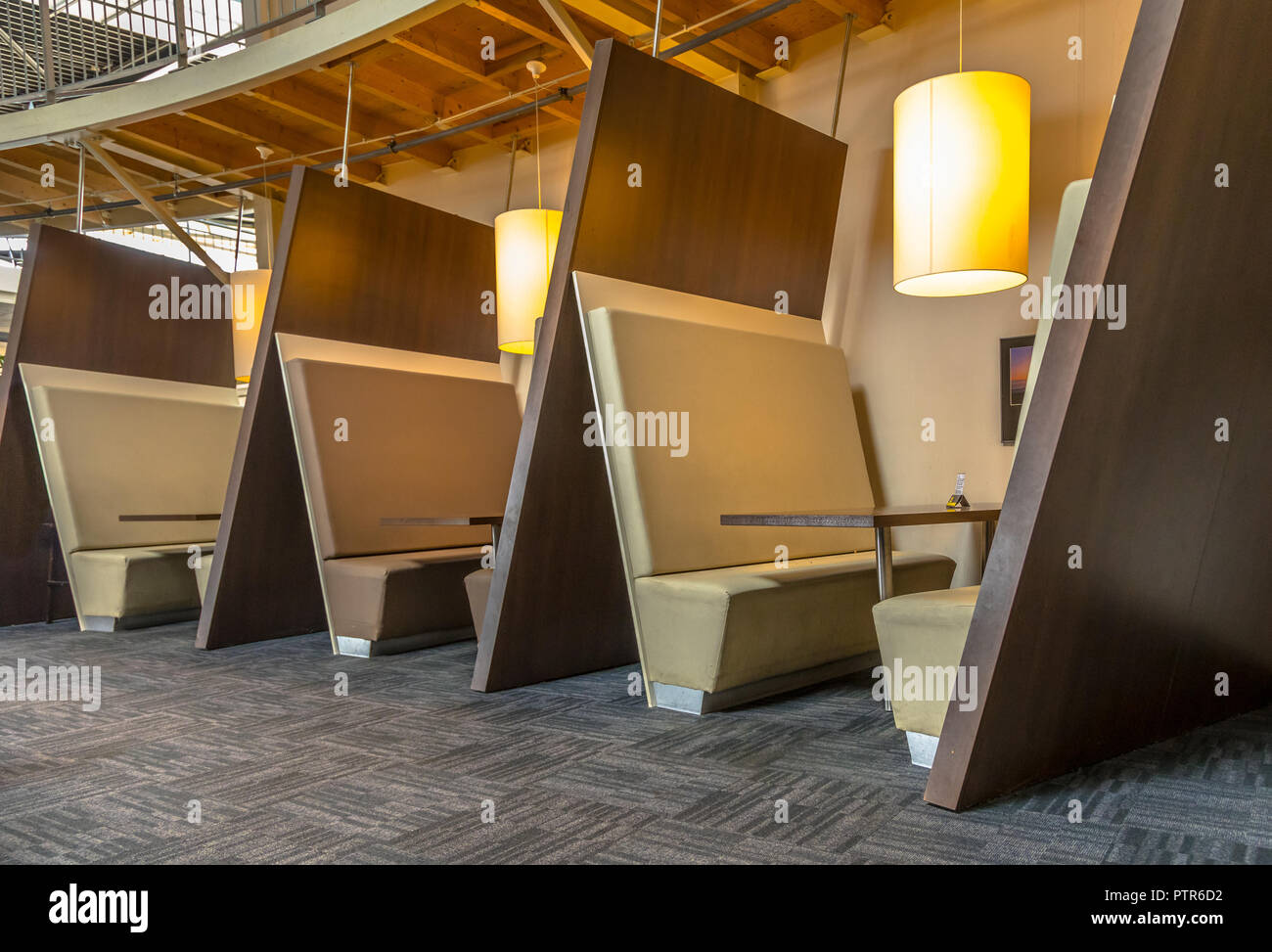 Modern restaurant booth seats in brown shades Stock Photo