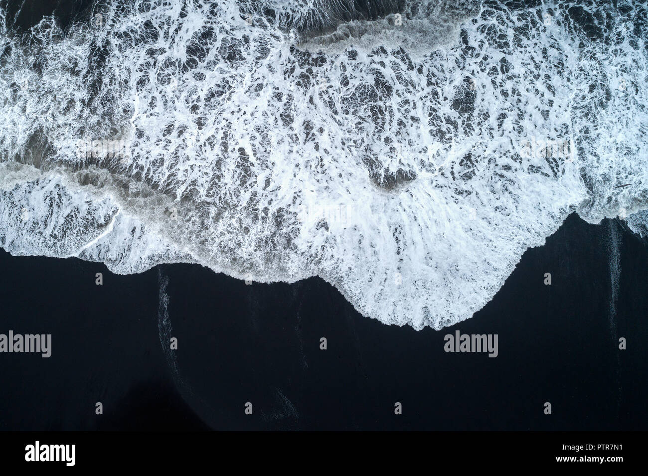 Aerial view of Black sand beach and ocean waves in Iceland Stock Photo ...