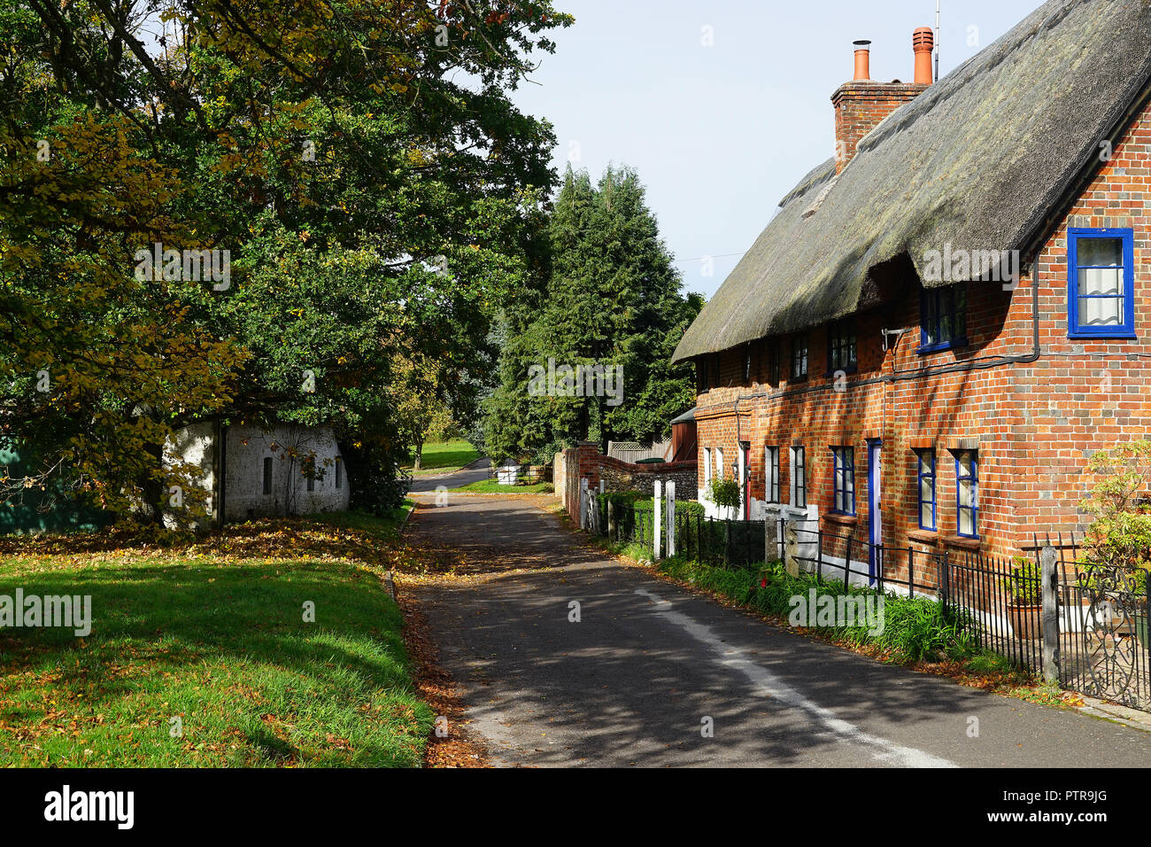 Cottages by the village green at North Waltham, Hampshire Stock Photo