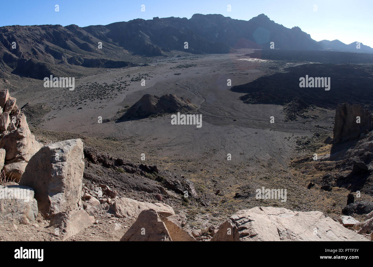 Volcanic landscape at the Mirador Roques de Garcia on the way to the Pico del Teide on the Canary Island of Tenerife on 18.09.2018. The rock formation Roques de Garcia is located about five kilometers south of the summit of Teide at an altitude of about 2200 m at the edge of the extensive Caldera Las Ca-adas. The area is part of the Teide National Park (Parque Nacional del Teide). The Pico del Teide (also Teyde) is with 3718 m the highest elevation on the Canary Island of Tenerife and the highest mountain in Spain. It belongs to the municipality of La Orotava. In 2007, the territory of the Nat Stock Photo