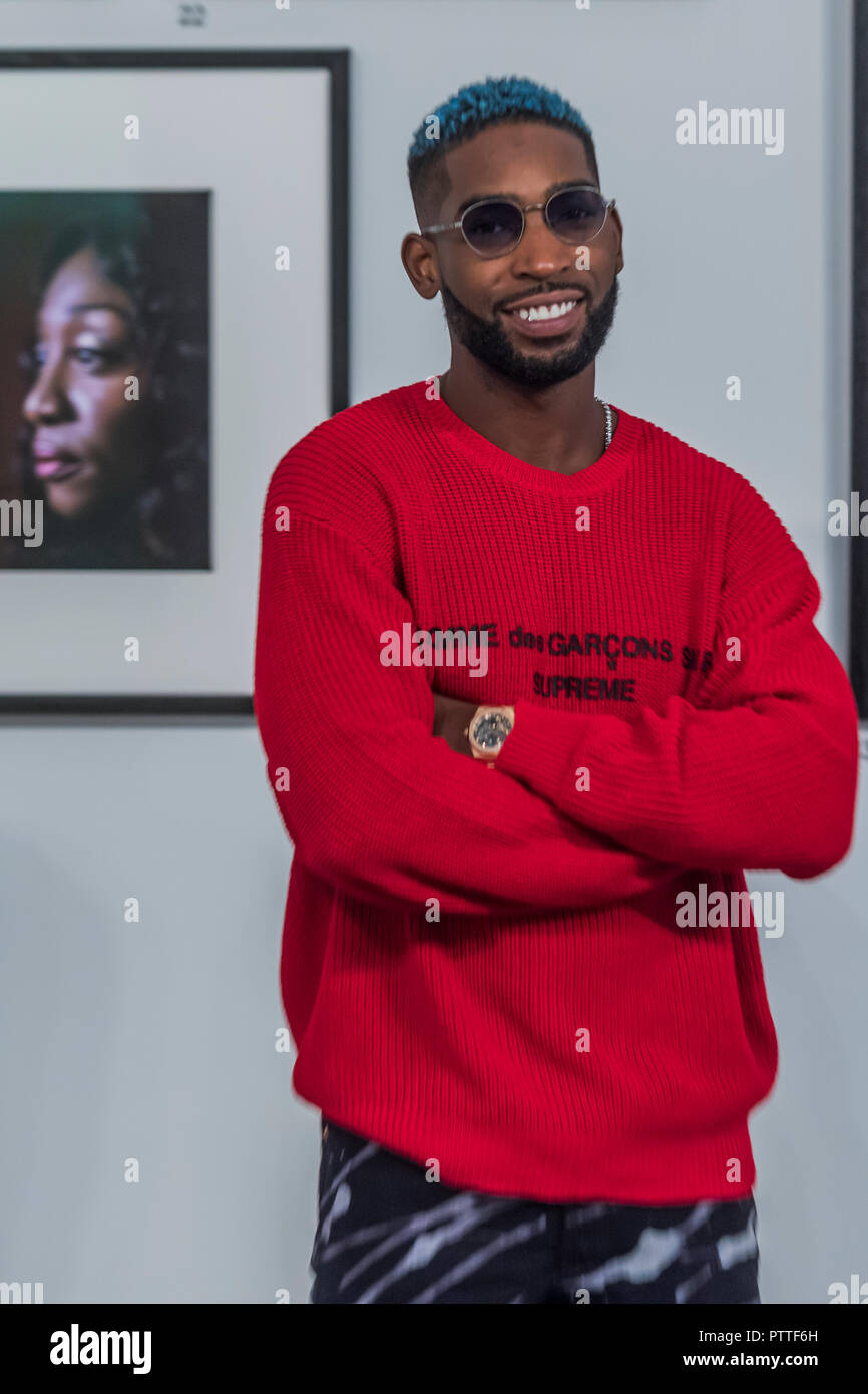 London, UK. 10th October, 2018. Tinie Tempah - Black is the New Black: Portraits by Simon Frederick at National Portrait Gallery, London, the Gallery’s largest acquisition of portraits of Afro-Caribbean (on display until 27 January 2019). Credit: Guy Bell/Alamy Live News Stock Photo