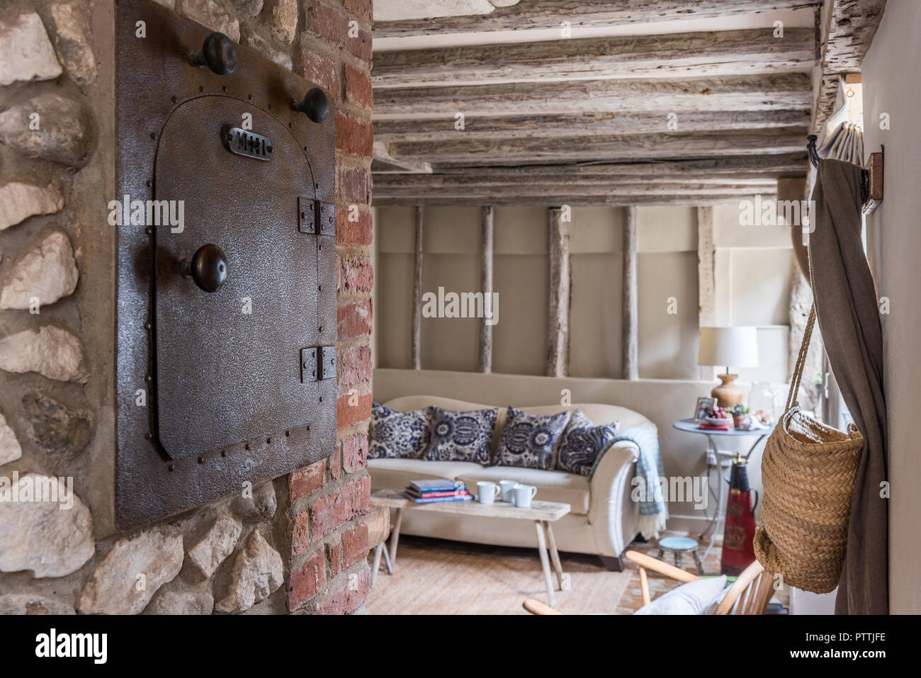 Original bread oven and lime-washed beams Stock Photo