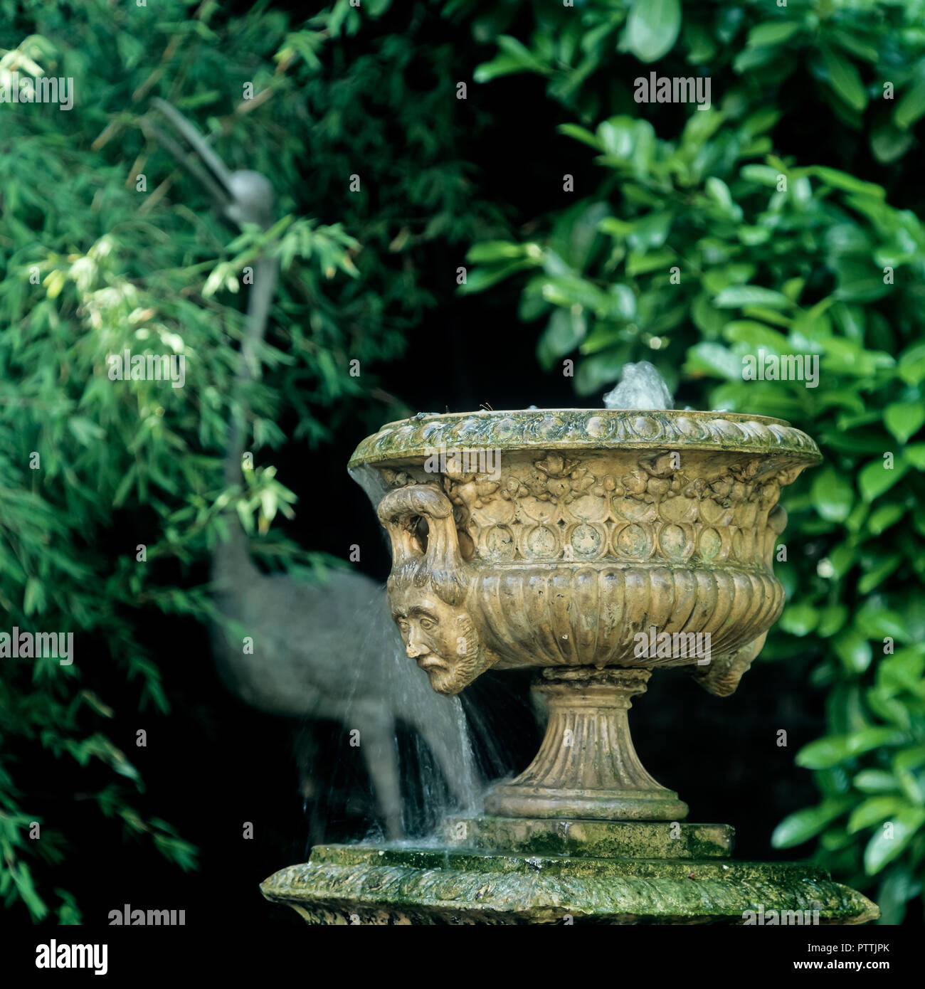 Historic urn and water feature Stock Photo