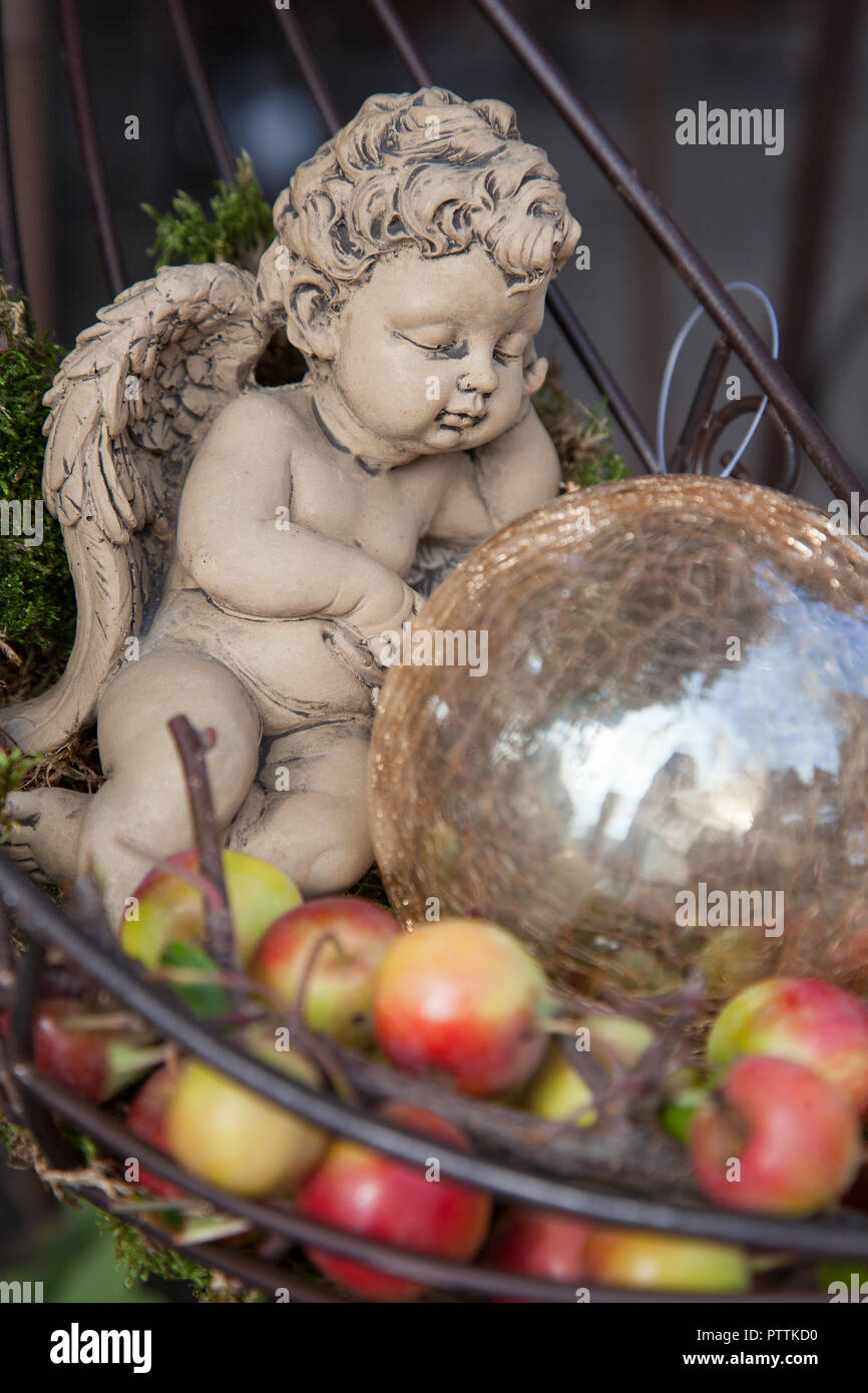 Small angel figurine outdoor garden decoration Stock Photo Alamy