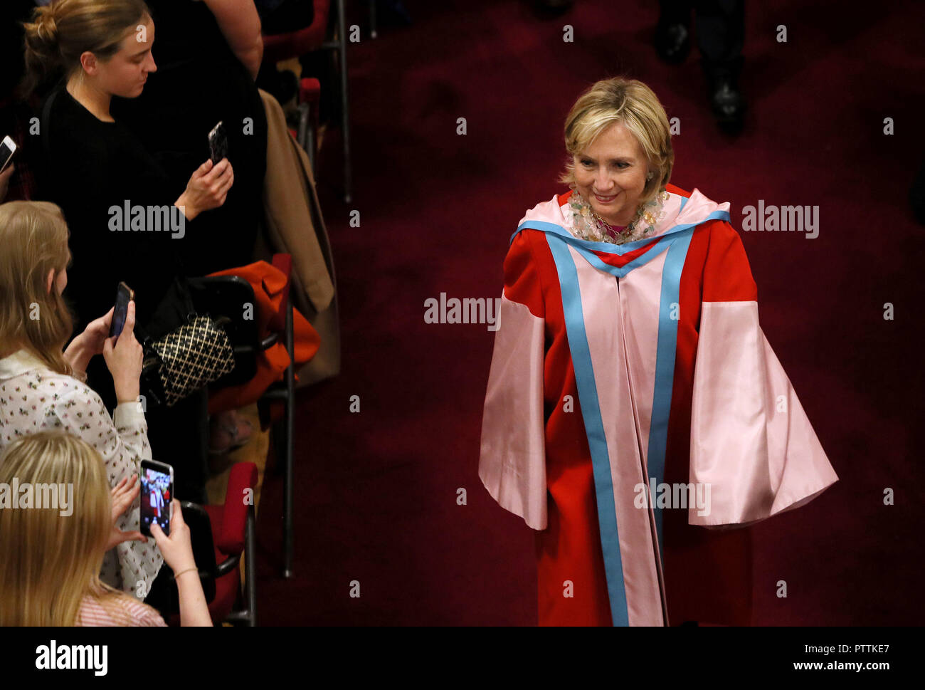 Hillary Clinton following a ceremony at Queen's University Belfast where she was awarded an honorary degree. Picture date: Wednesday October 10, 2018. The award, an honorary Doctor of Laws (LLD), is for her exceptional public service in the US and globally, and for her contribution to peace and reconciliation in Northern Ireland. See PA story ULSTER Clinton. Photo credit should read: Brian Lawless/PA Wire Stock Photo