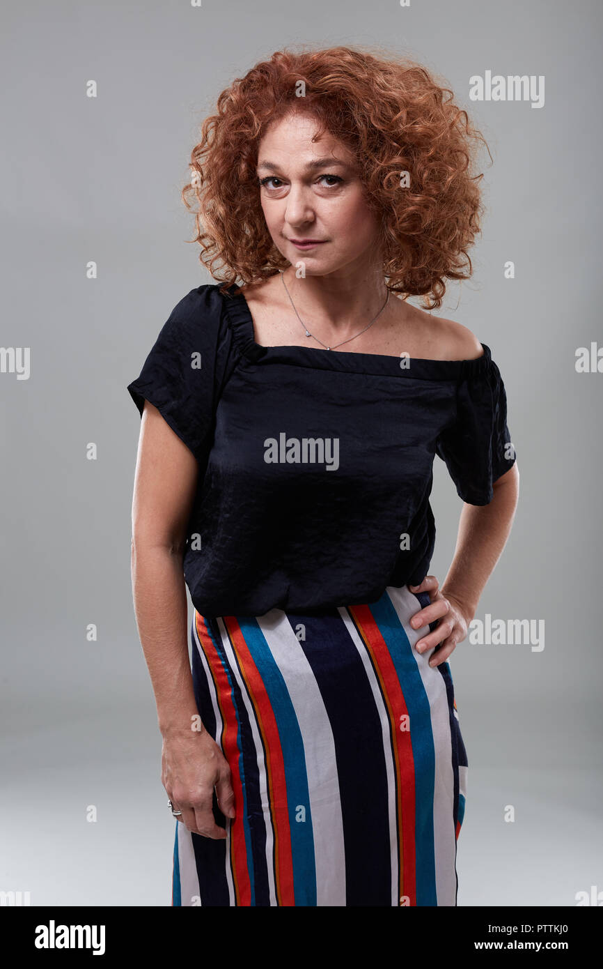 Mature woman in 50s curly hi-res stock photography and images - Alamy