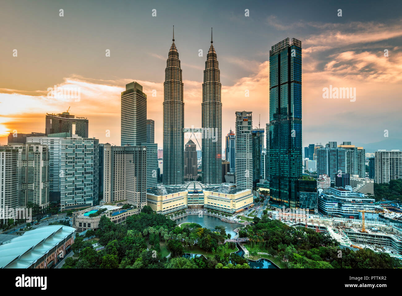 City skyline with Petronas Towers at sunset, Kuala Lumpur, Malaysia Stock Photo