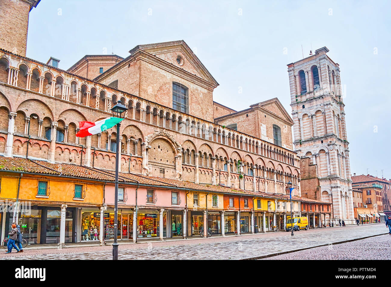 FERRARA, ITALY - APRIL 30, 2013: The south frontage of Ferrara Cathedral with stores on the ground floor and loggias above, on April 30 in Ferrara Stock Photo