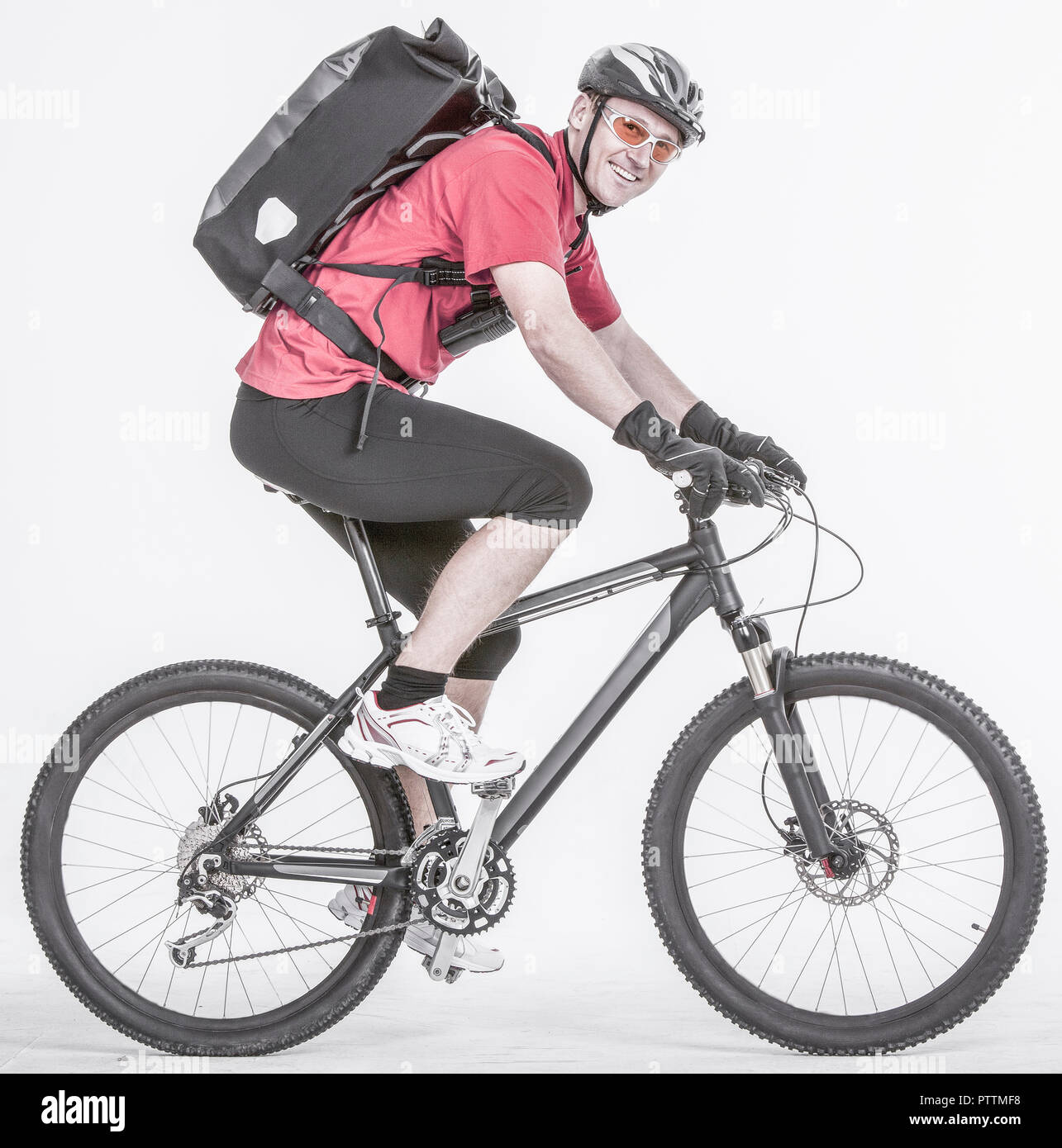 Fahrradkurier auf Rad (model-released) Stock Photo