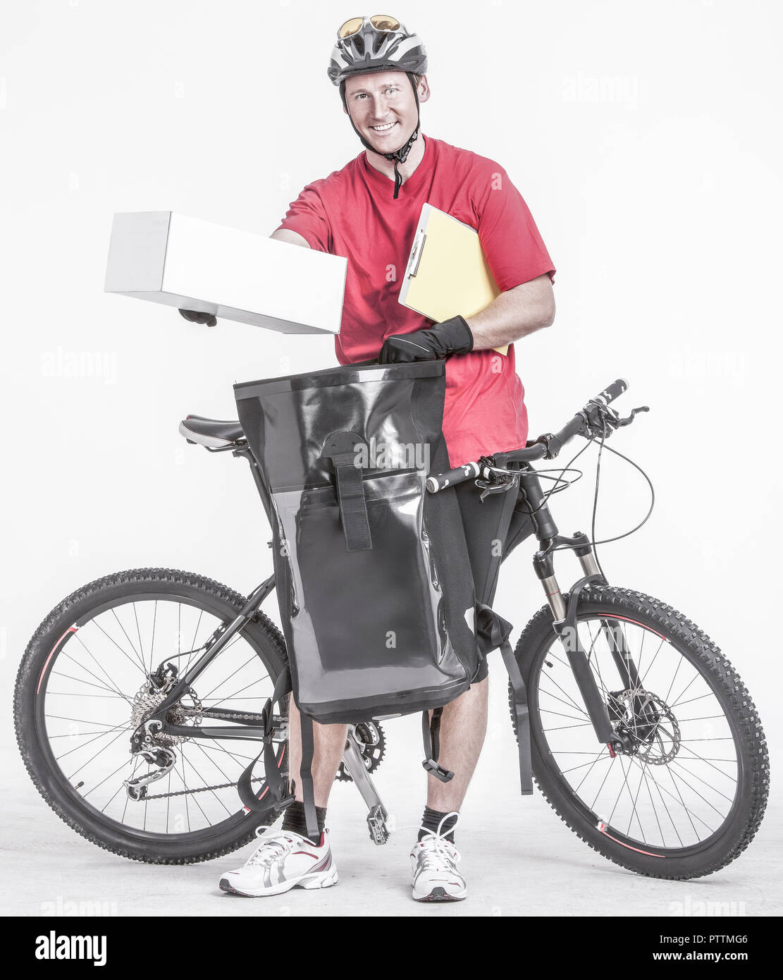 Fahrradkurier liefert Paeckchen aus (model-released) Stock Photo