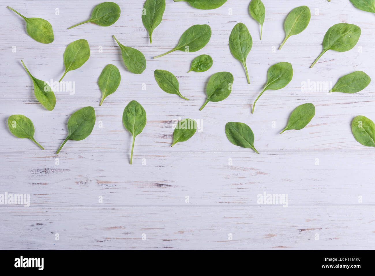 Young Spinach pattern background on white.Top view Stock Photo - Alamy