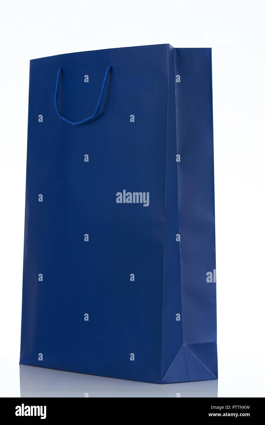 One blue shopping bag isolated on white background Stock Photo - Alamy