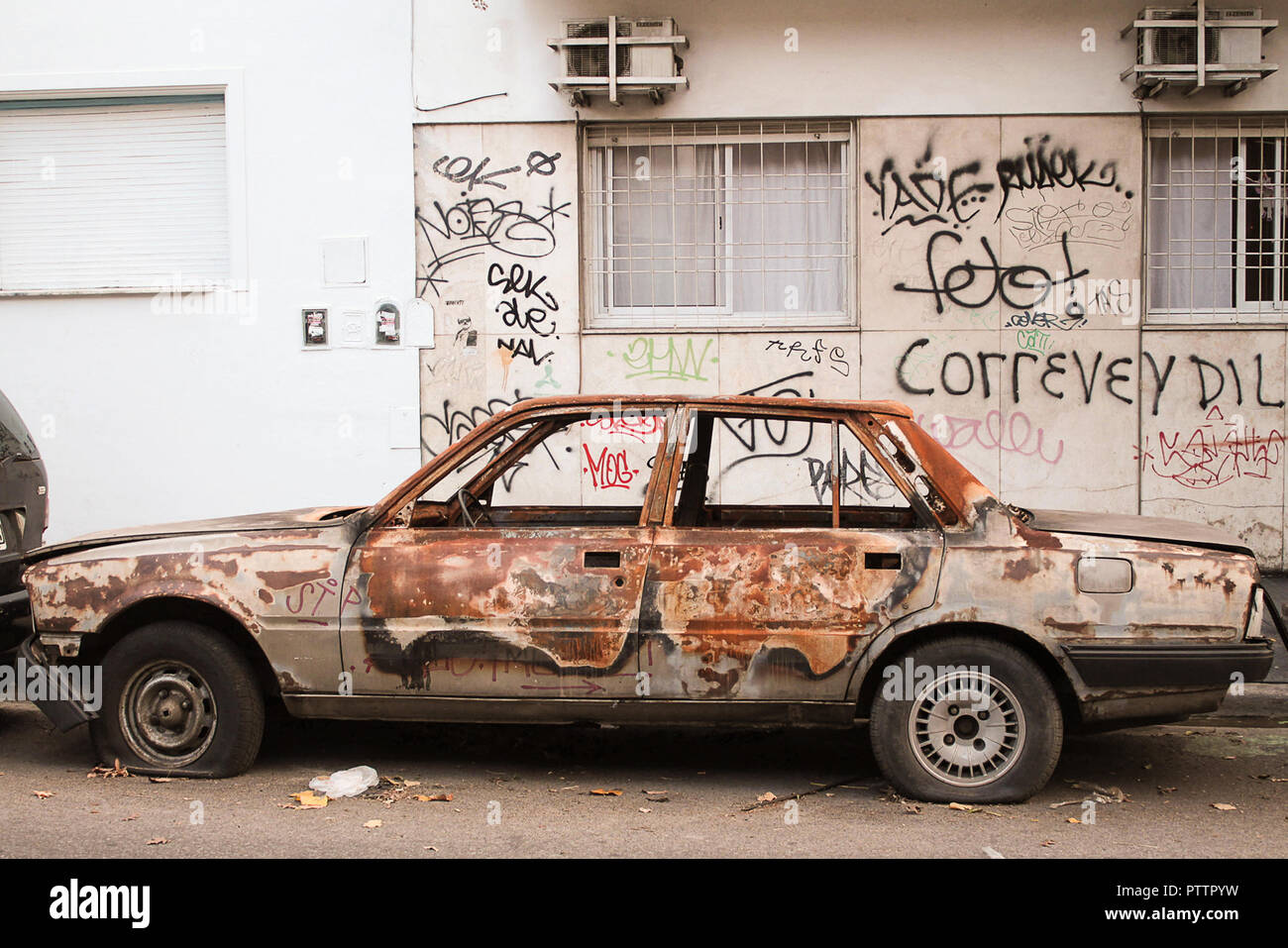 Rusty car shows hidden beauty around the block in Buenos Aires Stock Photo
