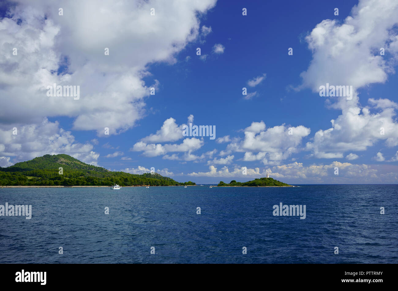 Mallorca Lighthouse Far d'Alcanada near Port d'Alcudia, Alcudia Bay, Mallorca, Spain. Stock Photo