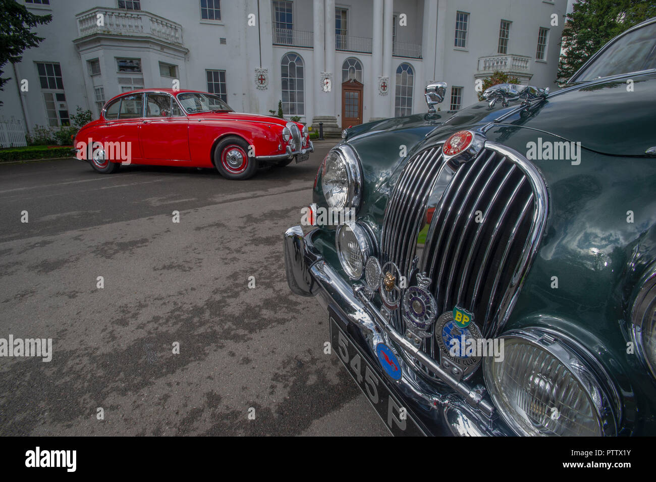 Mk2 Jaguar and Daimler V8 classic cars, badge engineered to use the same bodyshell Stock Photo