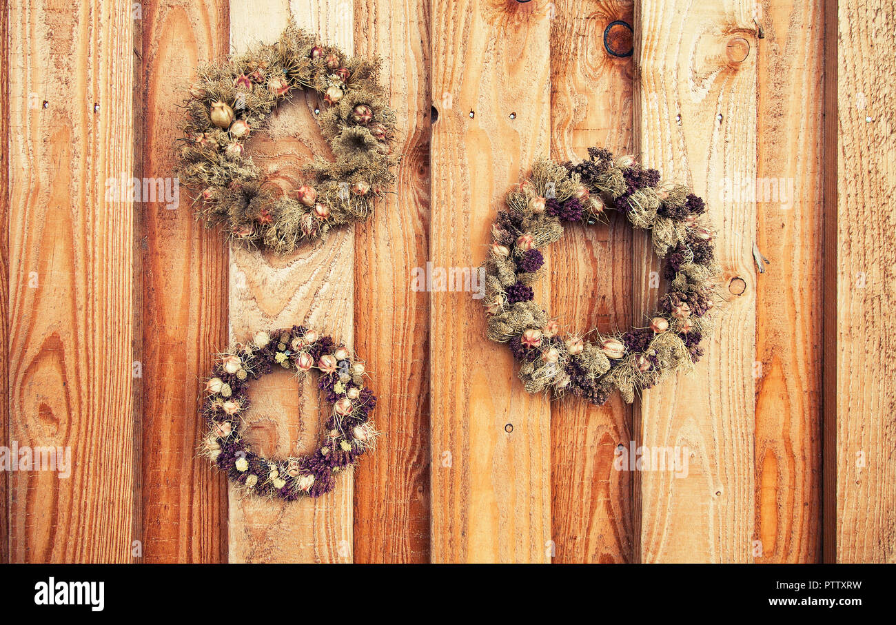 flower wreath on wooden rustic background Stock Photo