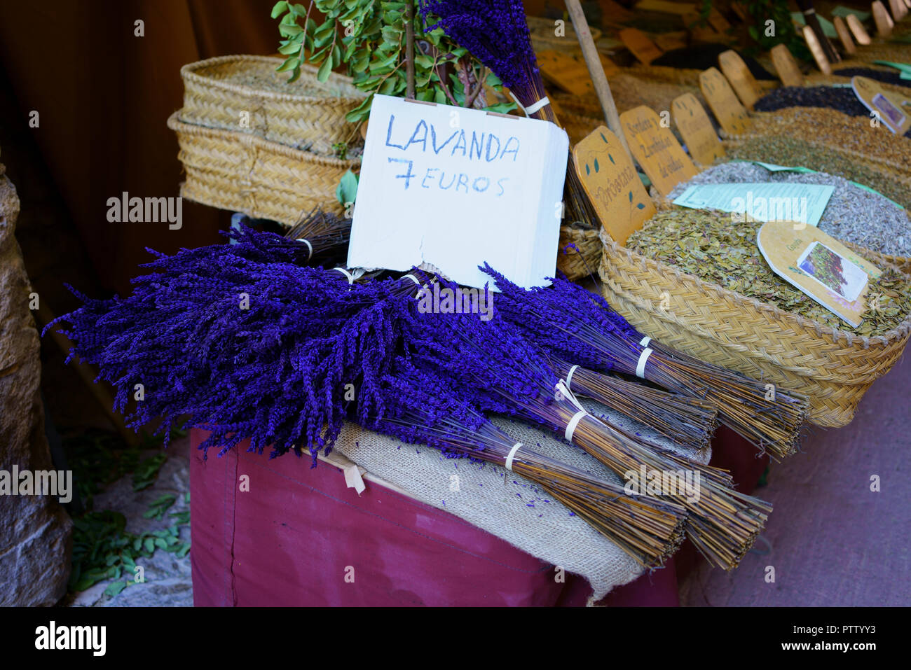Hand-crafted fragrant Lavender bunch in a Mediterranean market. Stock Photo
