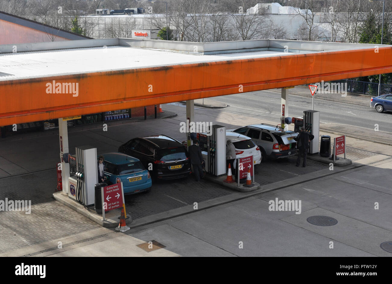 Sainsburys filling station, Abbeydale Sheffield UK, vehicles filling up on fuel Stock Photo