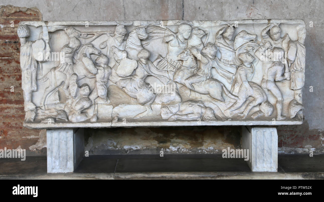 Italy. Pisa. CampoSanto. Roman sarcophagus. Roman army and roman Emperor on horseback attacking barbarian commander. Stock Photo