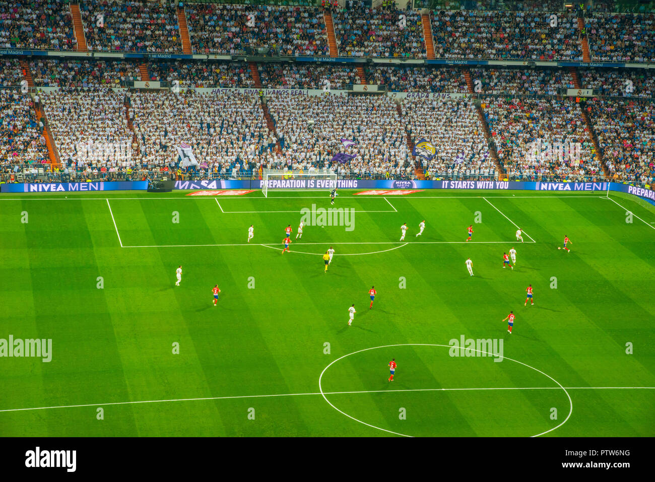 Football match Real Madrid versus Atletico de Madrid. Santiago Bernabeu stadium, Madrid, Spain. Stock Photo