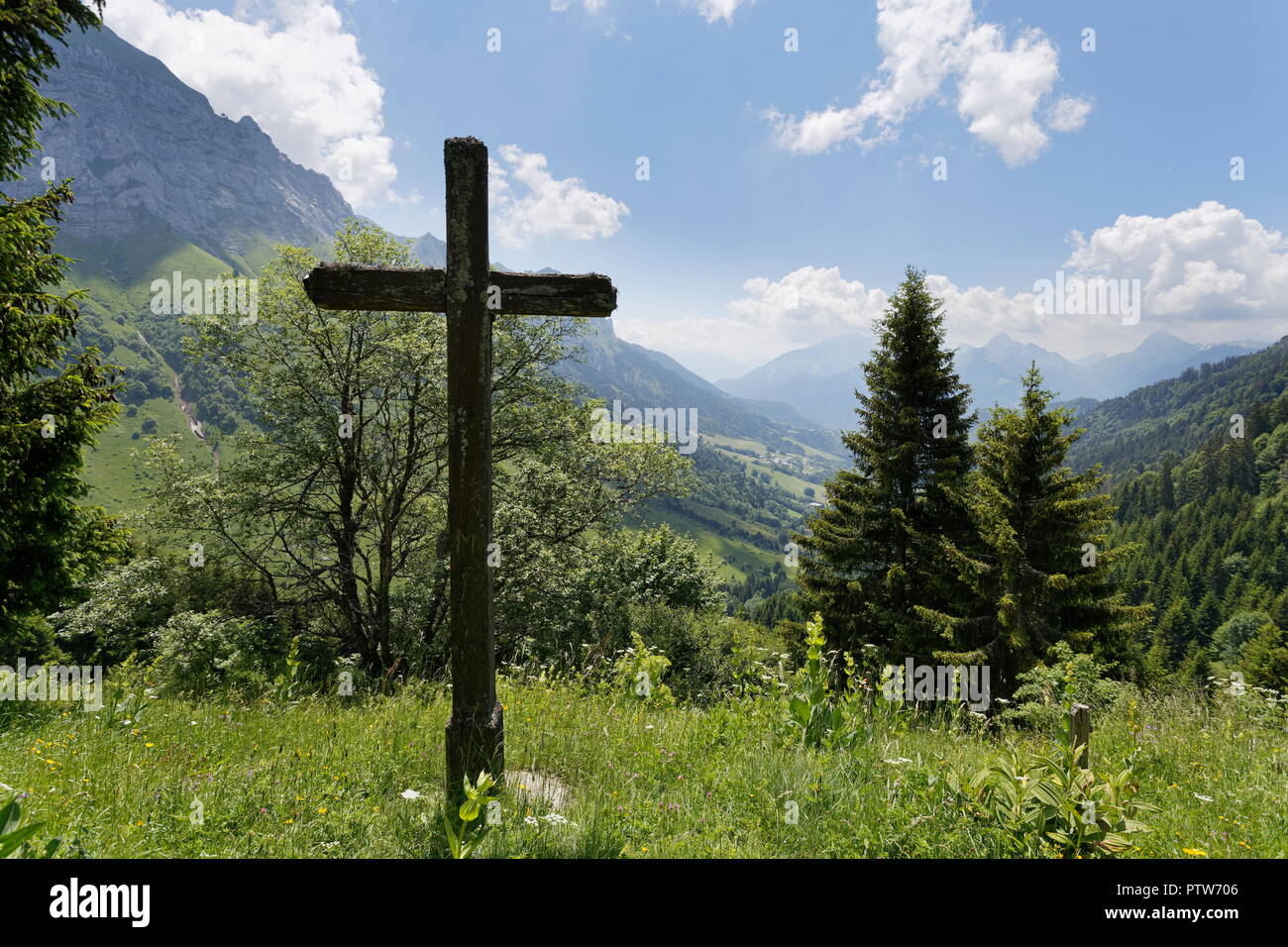 Large cross on one of the meadows nr Montmin above Lake Annecy France Stock Photo
