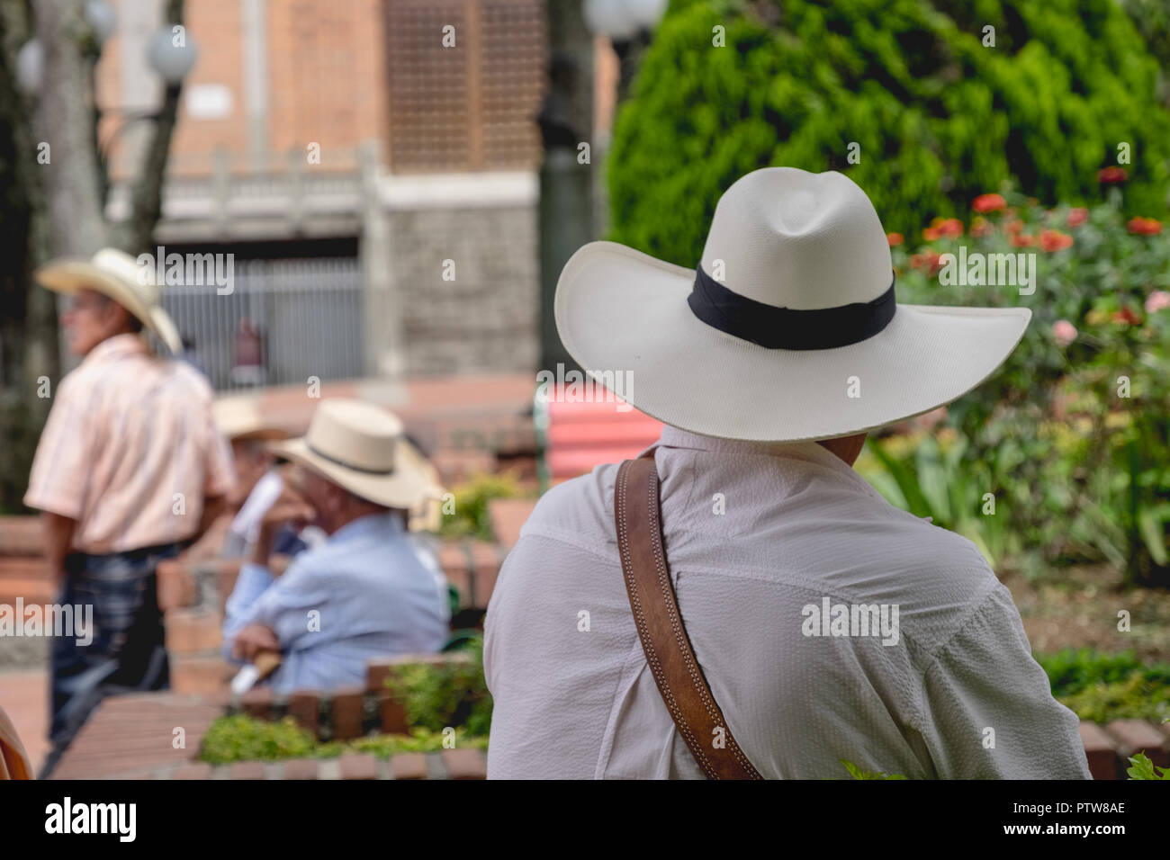MEN WEARING TYPICAL HAT ON THE STREETS OF JERICO - COLOMBIA Stock Photo