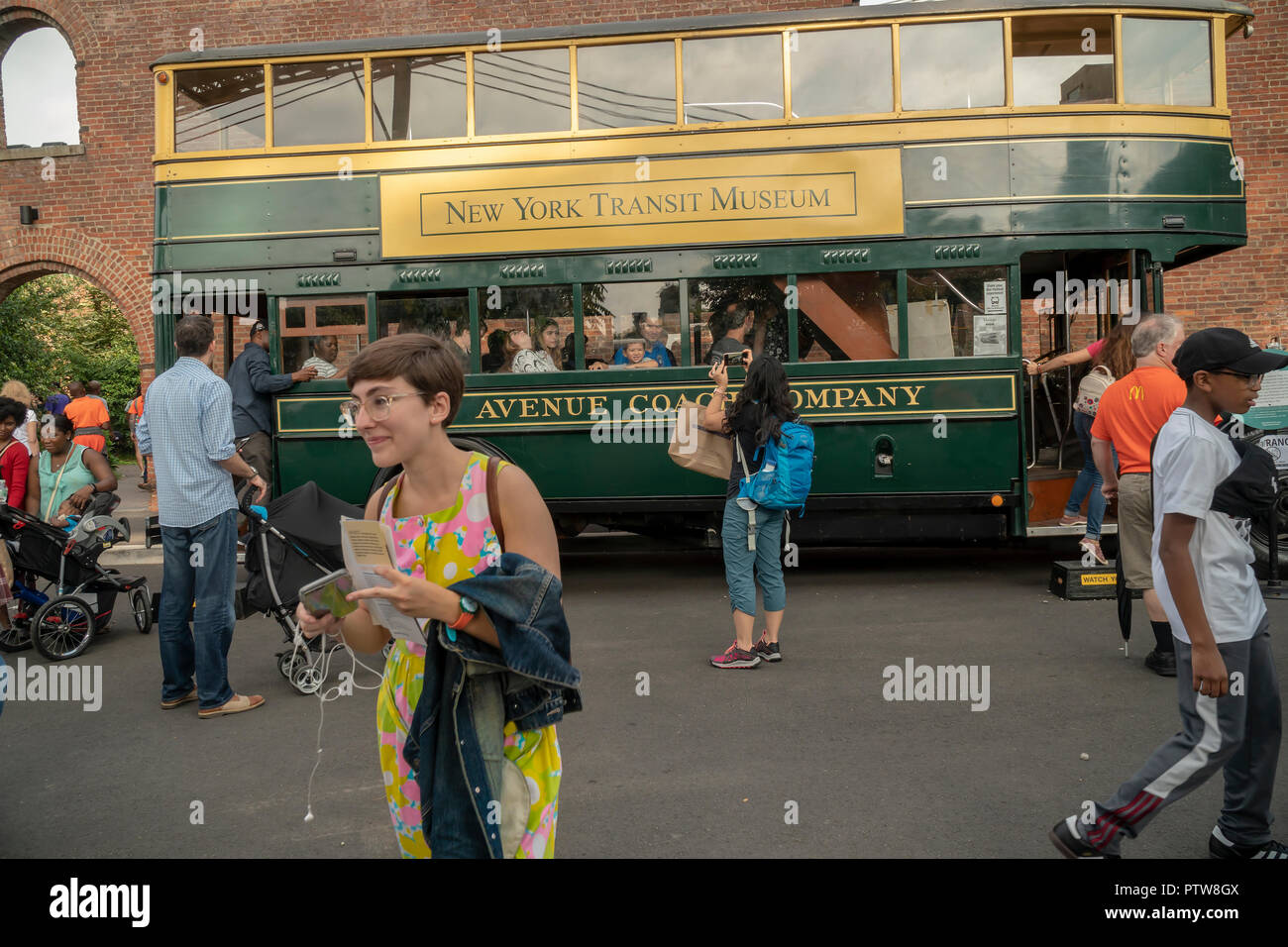 Double-decker bus at the 25th Annual New York City Transit Museum Bus Festival in Brooklyn Bridge Park in Brooklyn in New York on Sunday, October 7, 2018. Once a year the museum rolls out its fleet of vintage buses dating from the early 20th century to the most current vehicles allowing people to reminisce and wallow in nostalgia for the vehicles, which become a sort of time machine taking visitors back to another era. (Â© Richard B. Levine) Stock Photo