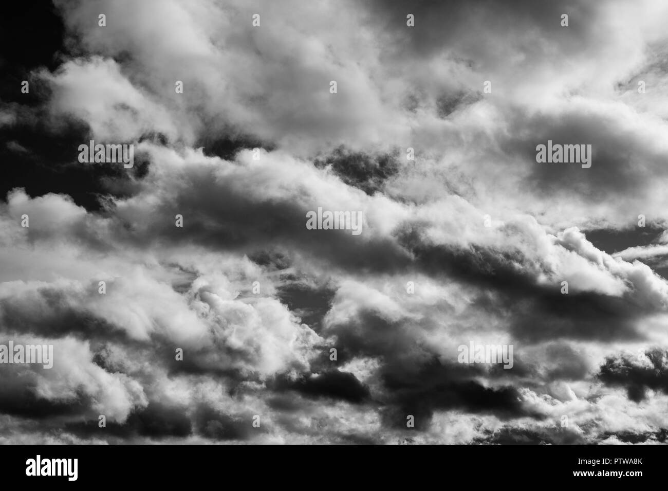 Altocumulus undulatus clouds making for a dramatic sky. Stock Photo