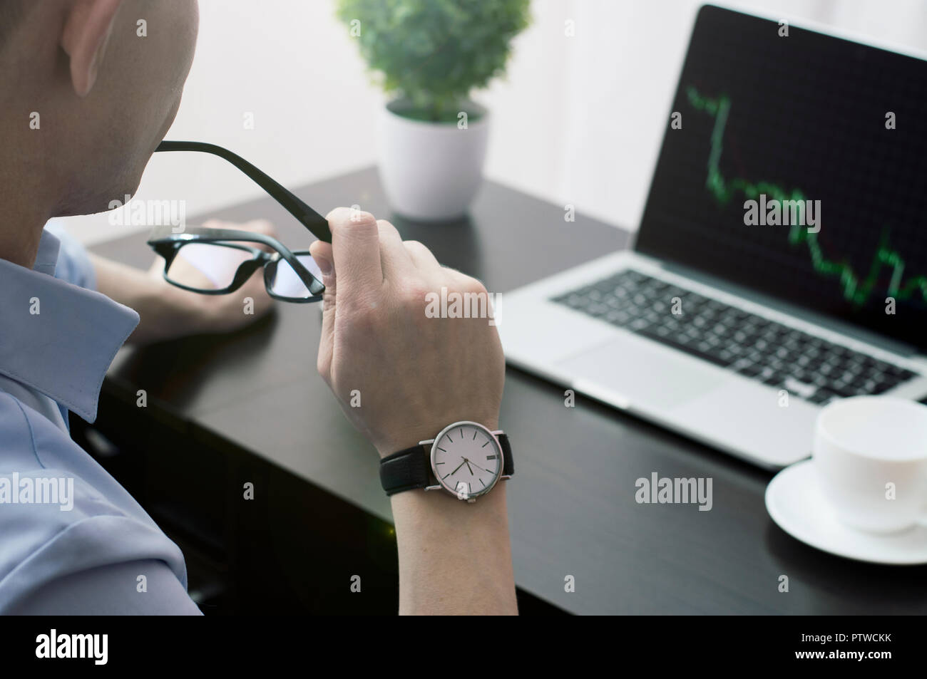 Trader working in the office. Stock Photo