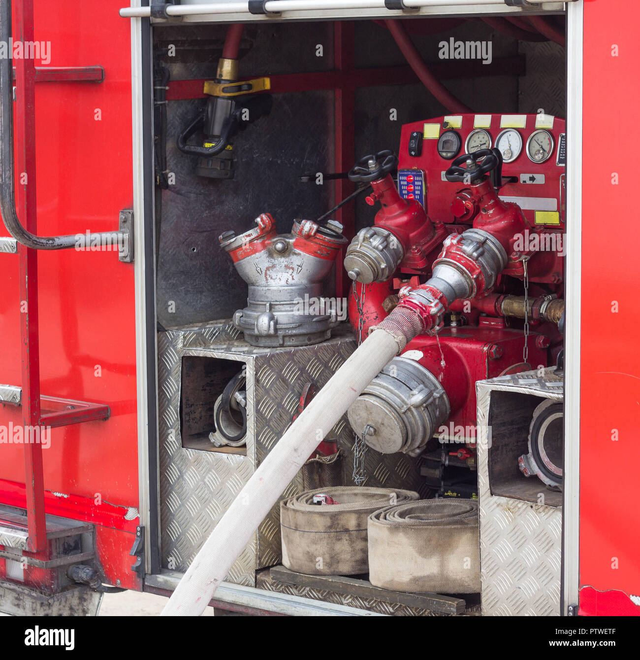Back of the fire truck, hoses and equipment, red fire engine, special