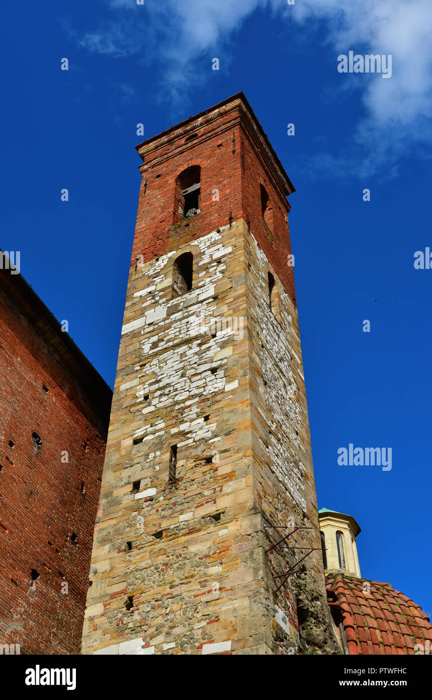 Characteristic Saint Augustine medieval bell tower in Lucca, built of stone and red brick in the 14th century Stock Photo