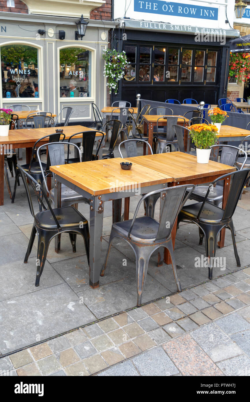 Empty tables and chairs outside UK pub Stock Photo