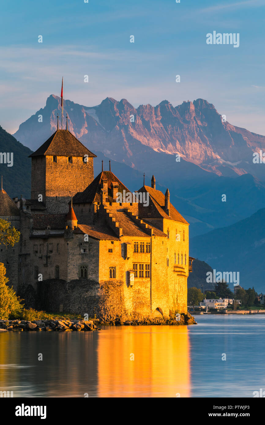 Chillon Castle (French: Château de Chillon) is an island castle located on Lake Geneva (Lac Léman), south of Veytaux in the canton of Vaud. Stock Photo