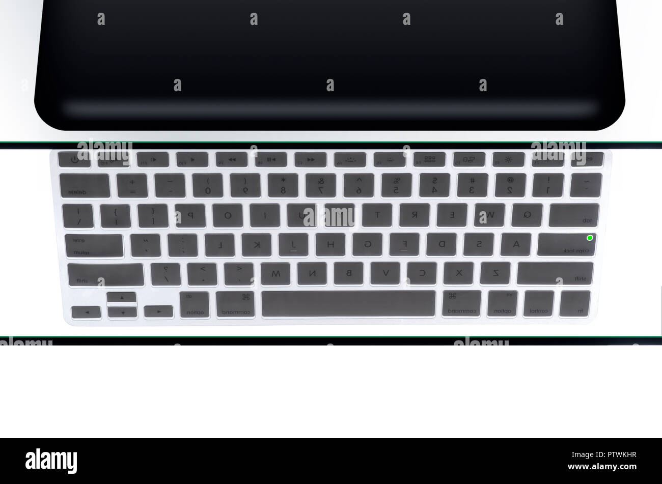 High angle of laptop keyboard, backlit Stock Photo