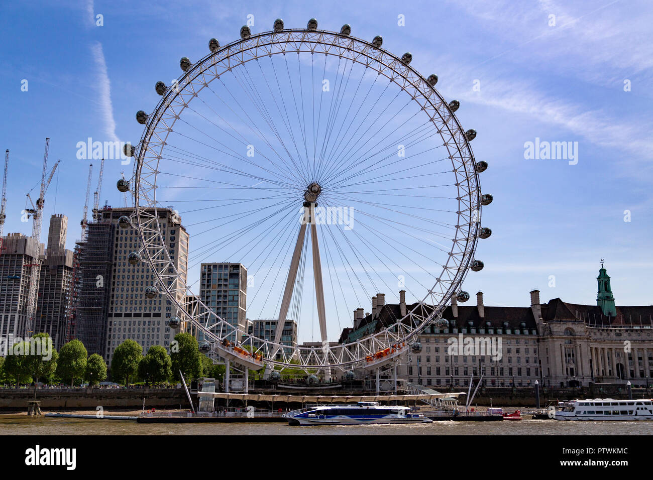 London Eye or Millennium Wheel on South Bank of River Thames in London England, UK Stock Photo