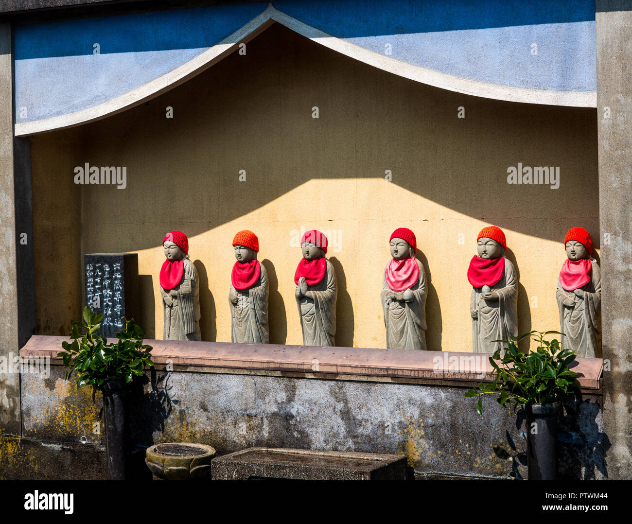Buddhist statues at entrance to cemetery, henro no michi trail, Shikoku