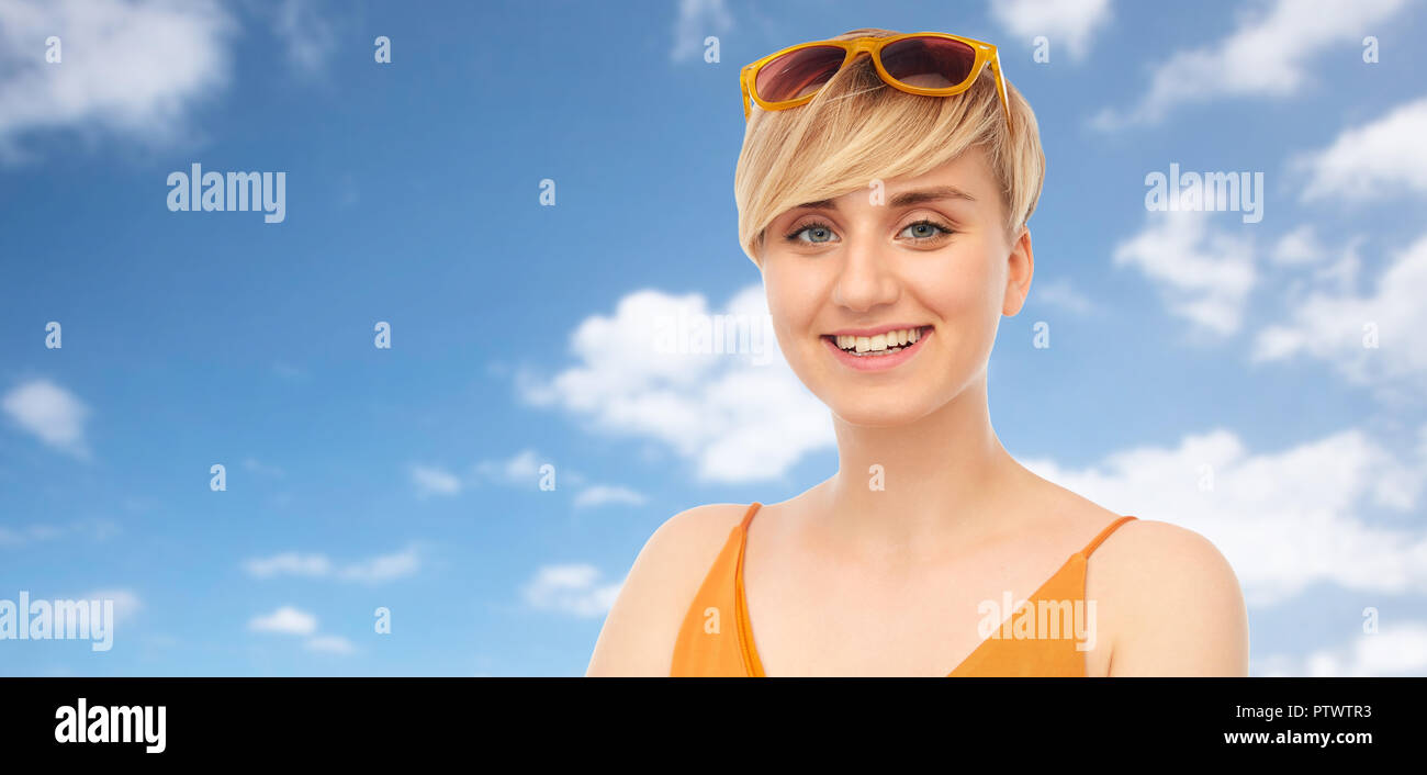 portrait of smiling teenage girl with sunglasses Stock Photo - Alamy
