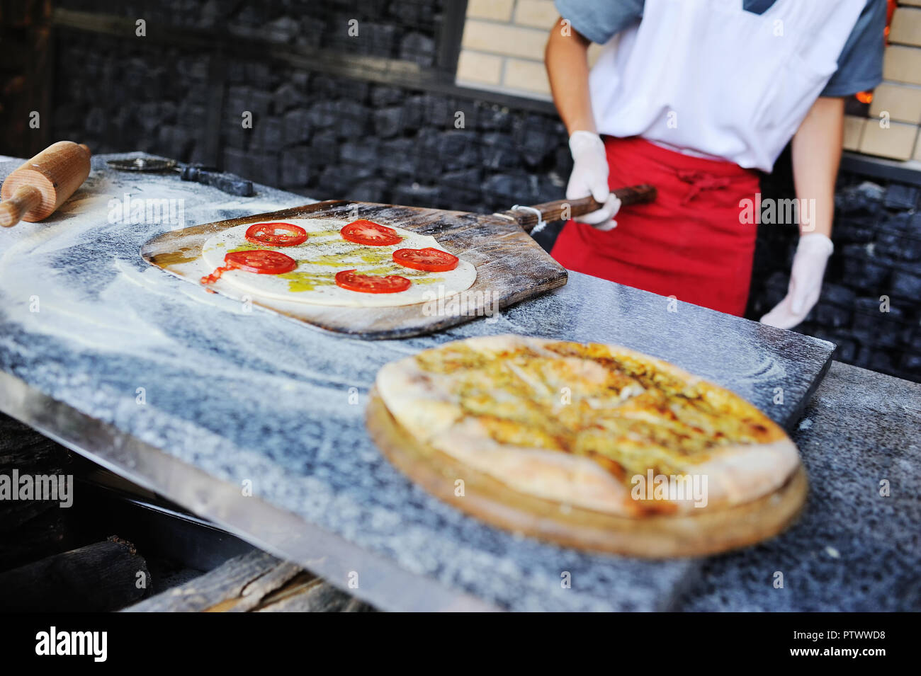 Preparation of focaccia or Italian bread in the oven Stock Photo Alamy