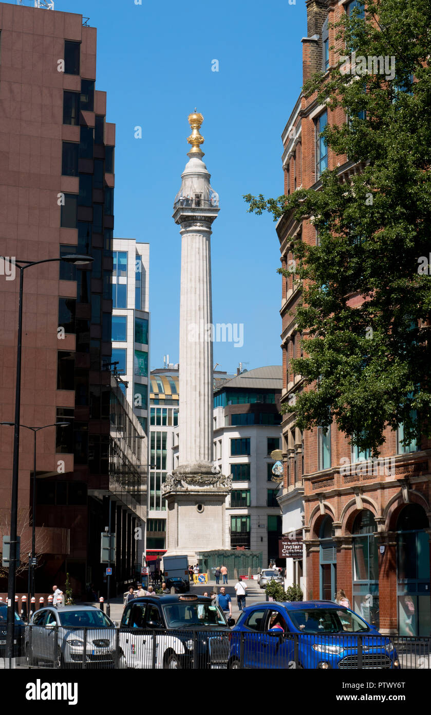 The Monument or Monument to the Great Fire of London is a Doric Column and was constructed between 1671 and 1677 to commemorate  Great Fire of London. Stock Photo