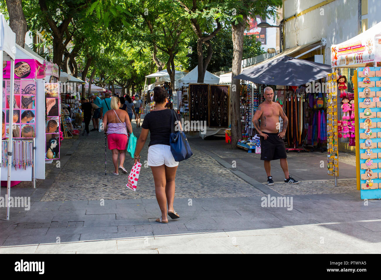 28 September 2018 Tourists stroll the cobbled streets of the Old Town in Albuferia on the