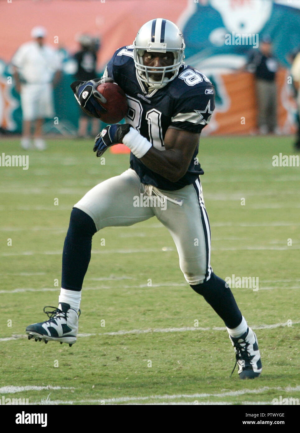 Dallas Cowboys Wide Receiver Terrell Owens Runs For A First Down
