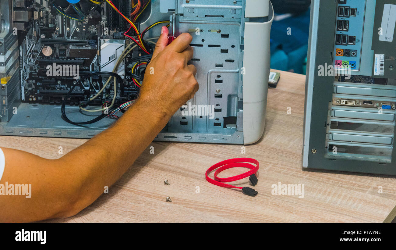 a man fixing a computer Stock Photo Alamy